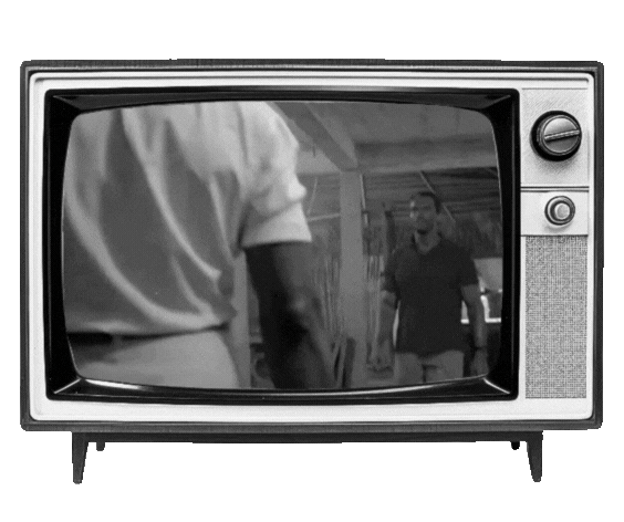 A vintage television set playing a clip